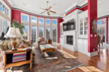 Step into luxury with this stunning living room! Featuring a cozy fireplace, elegant built-ins, and a beautiful rug, this space is perfect for relaxation and entertaining.