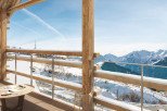 Experience breathtaking mountain views from this luxurious balcony.