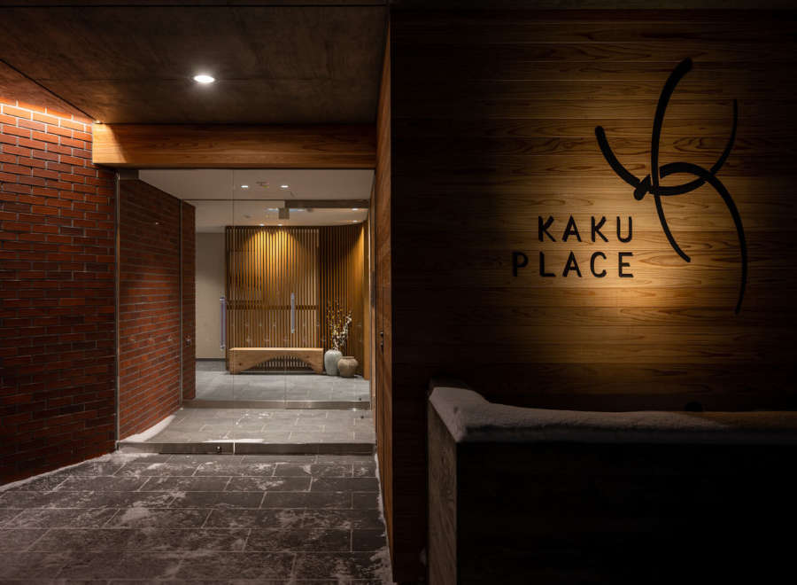 Kakku Place boasts a sleek and modern design, featuring a stunning wooden facade and a welcoming entrance.
