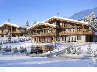 Luxury chalet in snowy mountain setting with stunning views.