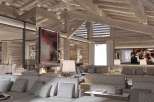 This luxurious chalet boasts a stunning open-plan living area with exposed wooden beams and a cozy fireplace.