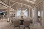 This luxurious chalet boasts a stunning open-plan dining area with a large table perfect for grand gatherings, complemented by a sophisticated bar area.