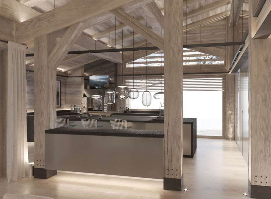 This stunning chalet boasts a spacious open-plan kitchen and bar area, perfect for entertaining guests.