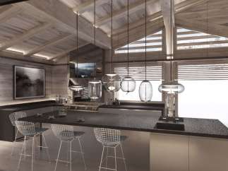 This stunning chalet boasts a spacious, open-plan kitchen with high-end finishes and a cozy atmosphere.