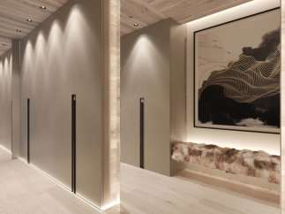 This stunning hallway boasts a sleek, modern design with built-in storage and ambient lighting.