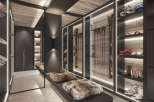 This luxurious ski room boasts ample storage for all your winter gear, including built-in shelving for skis, boots, and helmets.