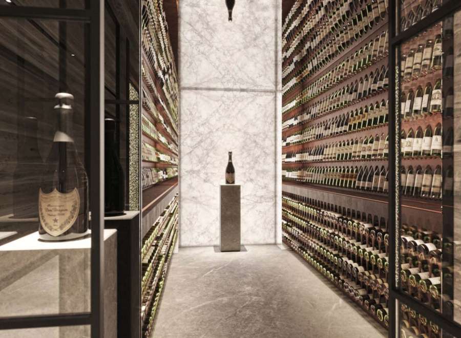 This luxurious property boasts a stunning, temperature-controlled wine cellar, showcasing an extensive collection of fine wines.
