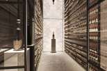 This luxurious property boasts a stunning, temperature-controlled wine cellar, showcasing an extensive collection of fine wines.