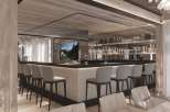 This luxurious chalet boasts a stunning bar area, complete with a sleek design and high-end finishes.