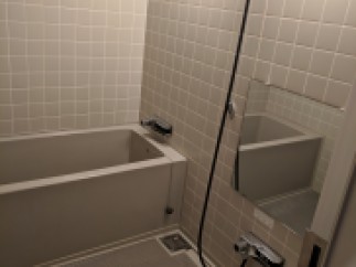 This bathroom features a sleek, modern design with a neutral color palette.