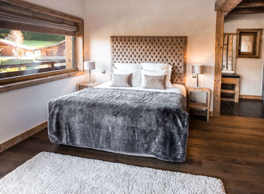 Luxurious chalet bedroom with stunning views.