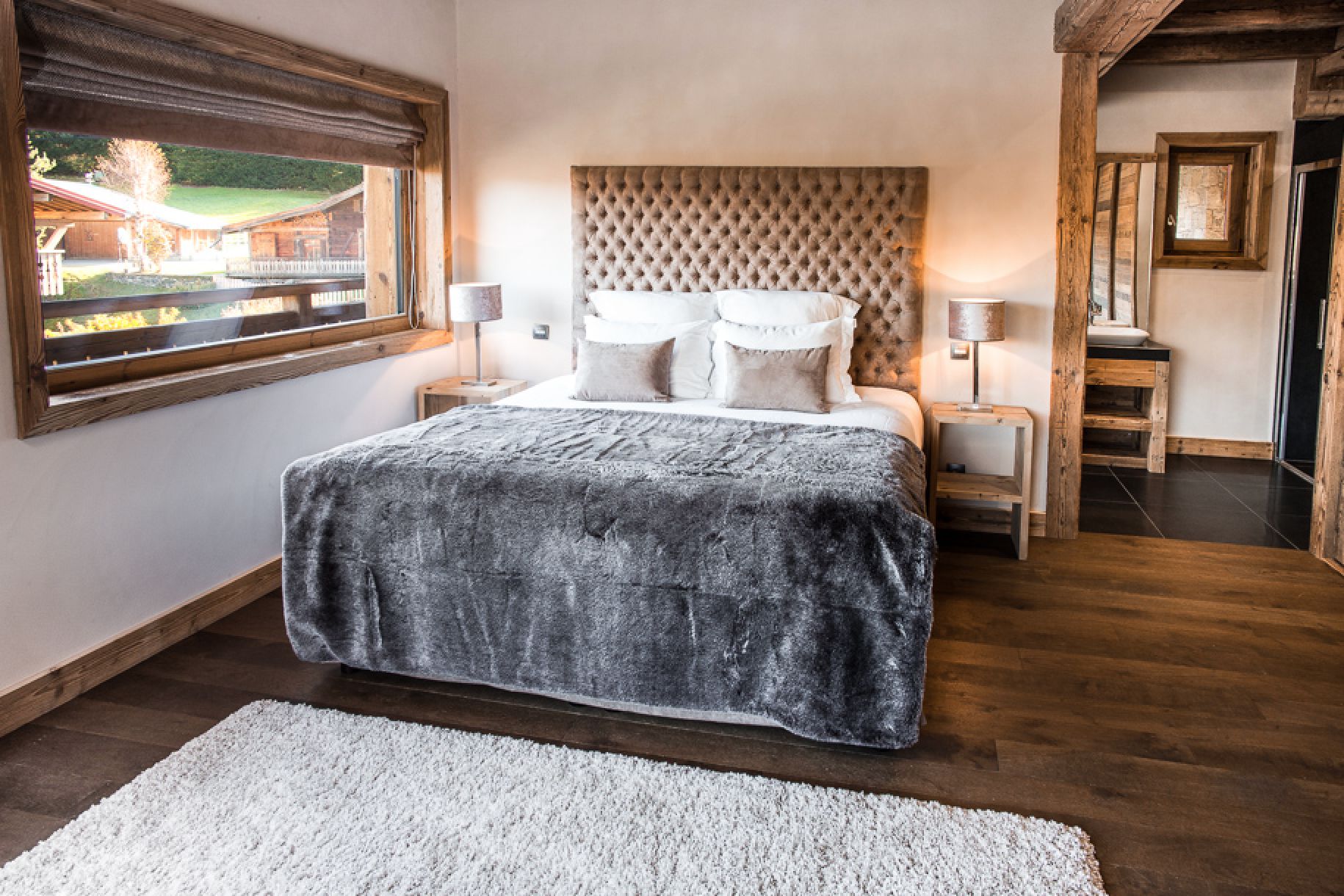 Luxurious chalet bedroom with stunning views.