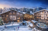 Luxury ski resort nestled in a snowy mountainside, featuring stunning architecture with spacious rooms and balconies.
