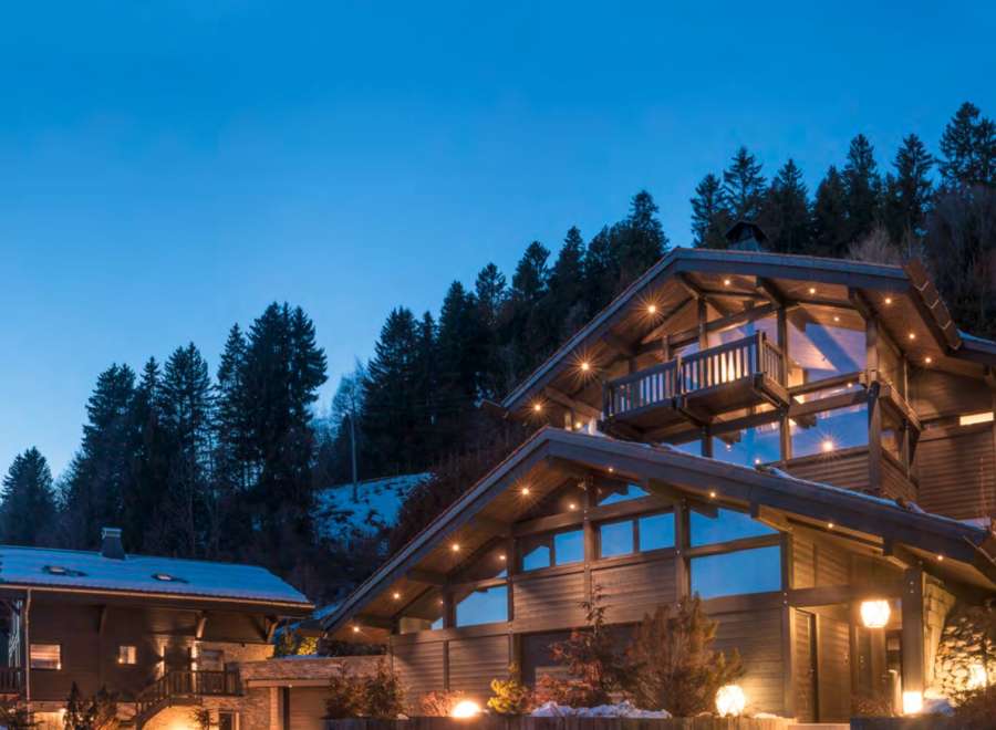 Luxury chalet nestled in the mountains, offering breathtaking views and stunning architecture.
