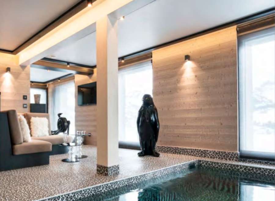 Luxury chalet with indoor pool and stunning mountain views.