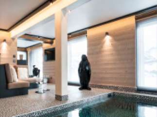 Luxury chalet with indoor pool and stunning mountain views.