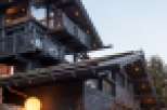 This stunning chalet boasts a unique architectural design, multiple balconies offering breathtaking views, and luxurious interior finishes.
