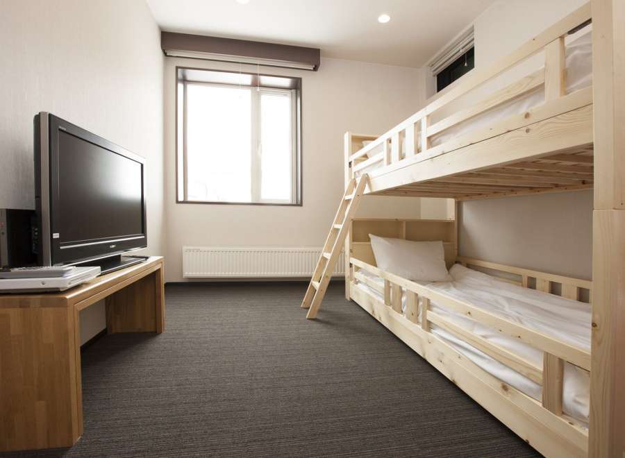 Cozy room with a bunk bed, perfect for families or friends traveling together.