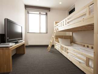 Cozy room with a bunk bed, perfect for families or friends traveling together.