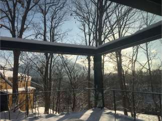 Stunning winter views from this modern home's deck.