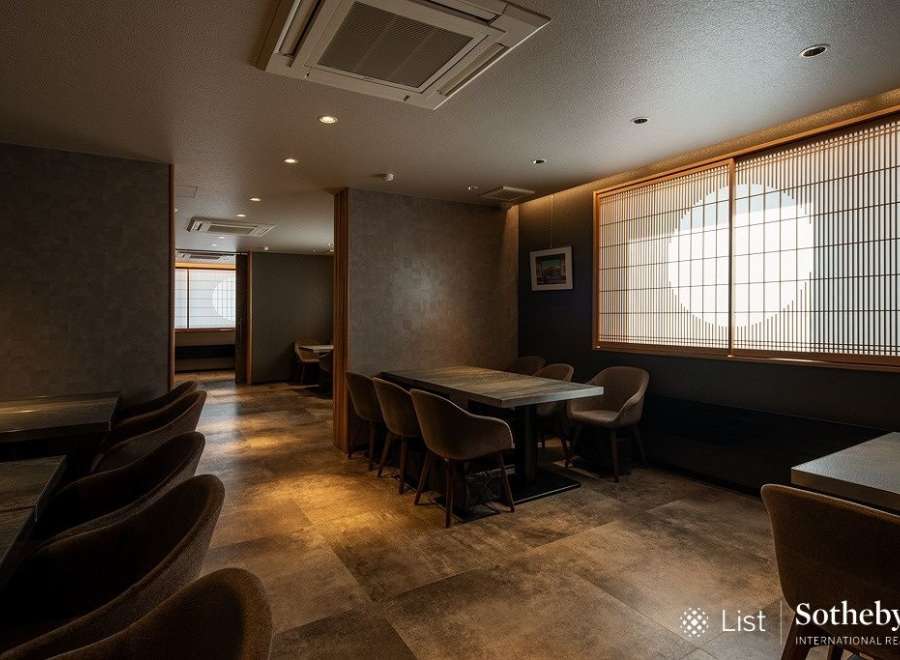 Sophisticated dining space featuring a sleek design and warm color palette.