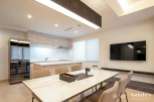 Modern kitchen with sleek appliances and ample counter space.