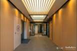 This stunning property boasts a sophisticated entrance with a sleek, modern design.