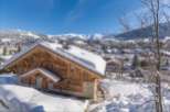Luxury chalet in the French Alps with stunning mountain views.
