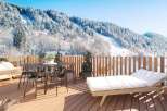 Enjoy breathtaking mountain views from this stunning outdoor deck.