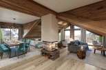 Experience luxury living in this stunning chalet, boasting a cozy fireplace and breathtaking mountain views.
