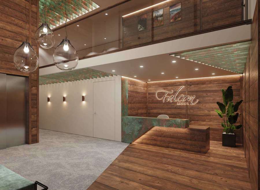 Step into the inviting lobby of Falcon Lodge, where rustic charm meets modern design.