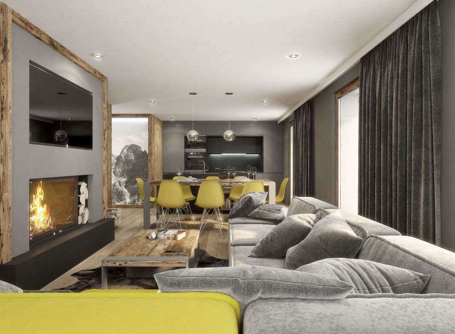 Experience luxury living in this stunning property, featuring a cozy fireplace and a modern kitchen.