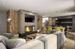 Experience luxury living in this stunning property, featuring a cozy fireplace and a modern kitchen.