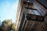 Discover the charm of this unique property, featuring stunning wooden balconies that offer a perfect blend of rustic and modern design.