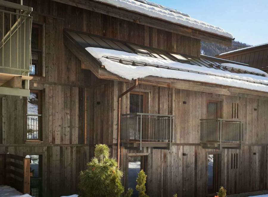 Discover the charm of this stunning wooden chalet, perfect for a cozy winter getaway.