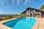 Luxury villa with stunning panoramic views and a private pool.