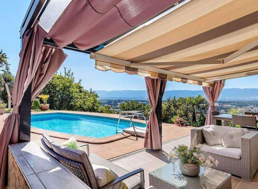 Luxury villa with stunning panoramic views and a private pool.