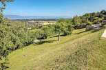 Spectacular panoramic views greet you from this elevated property, showcasing a picturesque landscape that stretches as far as the eye can see.