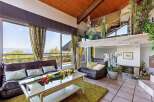Stunning home with panoramic views and a unique split-level design.