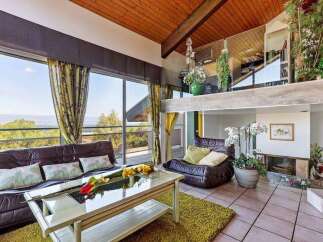 Stunning home with panoramic views and a unique split-level design.