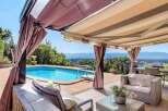 Luxury villa with stunning panoramic views and a private pool.