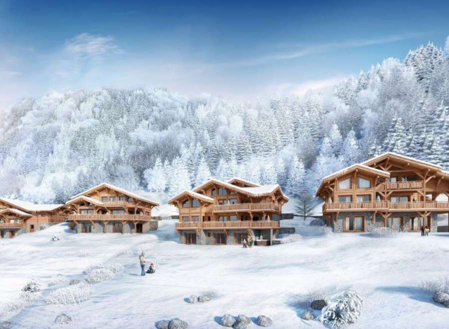 Luxury ski chalets nestled in a snowy mountainside, offering breathtaking views and serene winter landscapes.