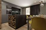 This stunning kitchen boasts modern design with sleek cabinetry and a functional island.
