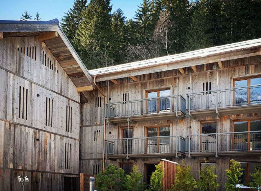 Discover the charm of this stunning wooden chalet nestled in a serene mountain setting.