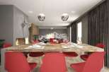 This stunning dining room boasts a modern design with a rustic touch.