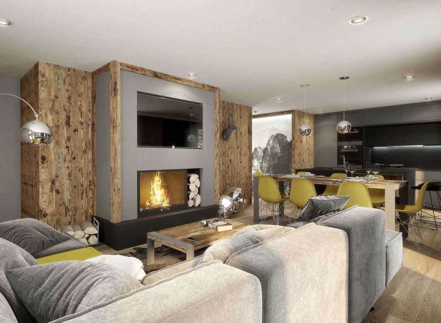 Experience luxury living in this stunning property, featuring a cozy fireplace and a modern kitchen.