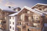 Discover the charm of this stunning ski chalet, boasting a unique wooden facade and snow-covered roofs.