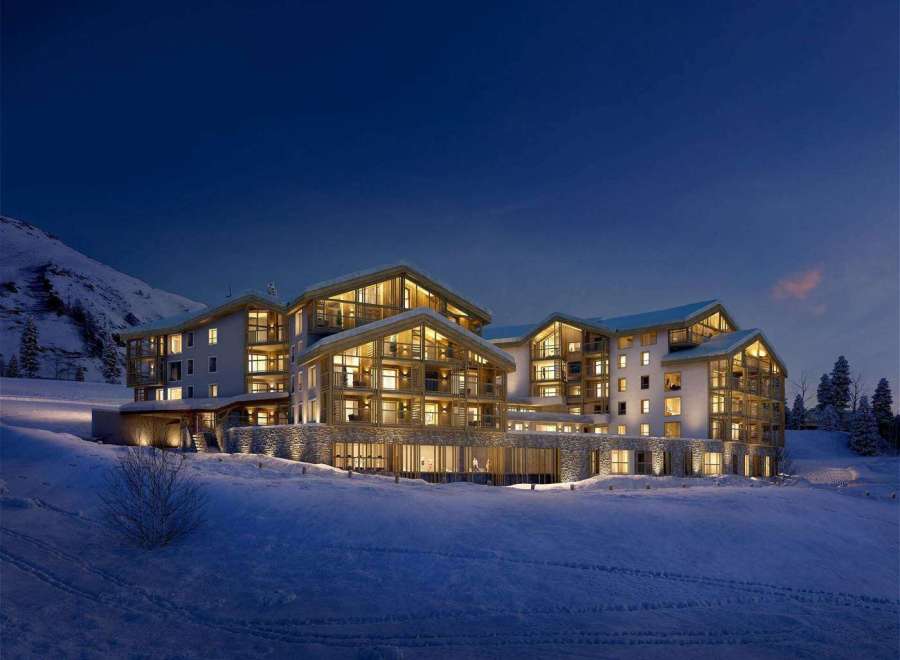 Experience luxury in this stunning mountain lodge, perfect for a winter getaway.