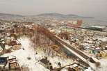 Discover a prime real estate opportunity in a picturesque winter landscape.