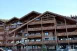 Discover the charm of this stunning wooden chalet, a perfect blend of rustic elegance and modern comfort.